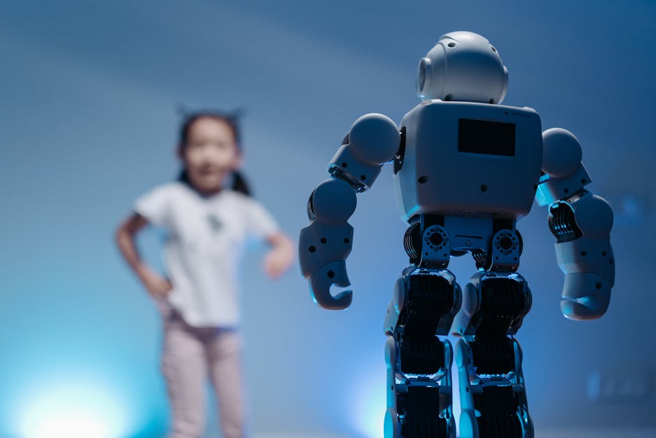 A young girl playfully interacts with a humanoid robot in a futuristic indoor environment featuring soft blue lighting.